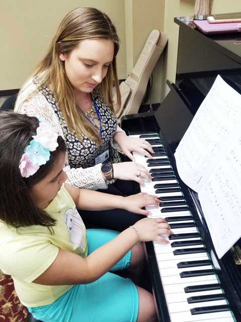 Kid playing the piano in Harahan, LA