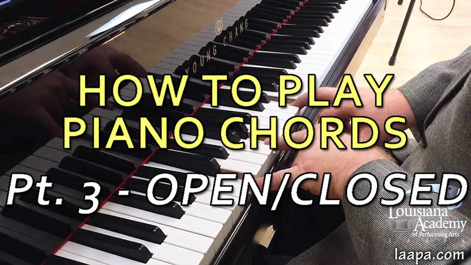 Playing open and closed position chords on the piano during lessons at LAAPA in New Orleans, Mandeville, and Covington, LA