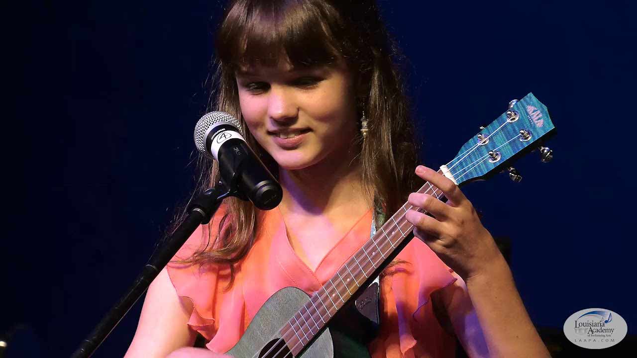 Ukulele students performing at LAAPA in New Orleans, Covington, and Mandeville, LA